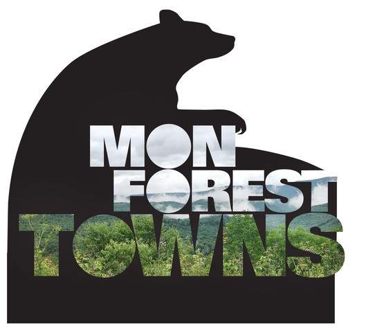 Mon Forest Towns logo, a bear silhouette