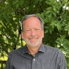 Portrait of Marc Berejka, Former Vice President of Community Advocacy and Impact at REI